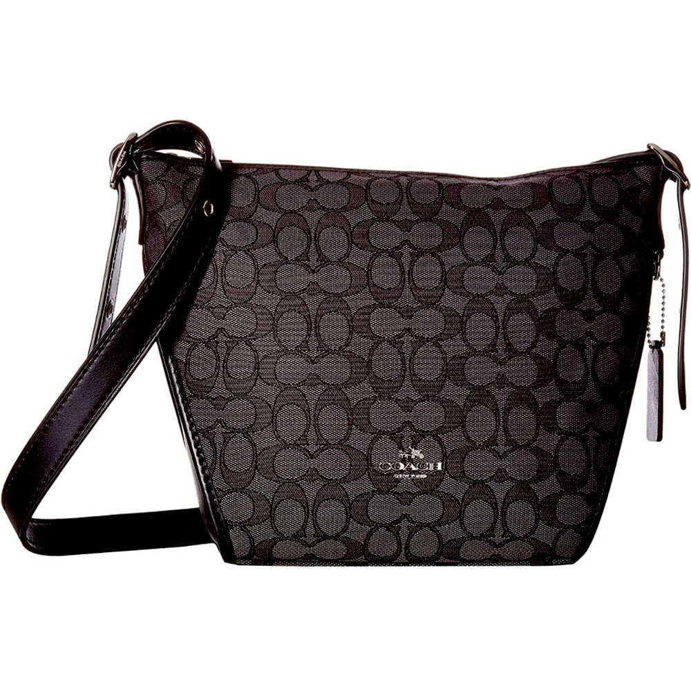 Coach Dufflette in in Signature Jacquard Fabric.